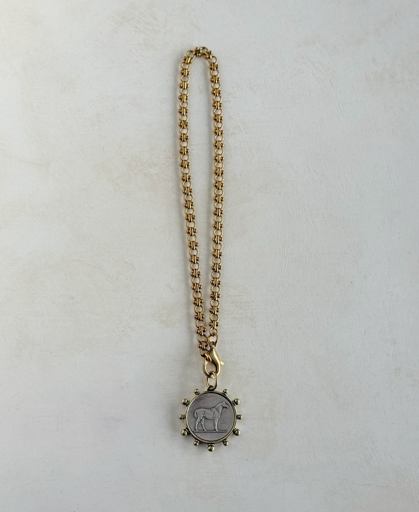Shadowfax brass equestrian pendant
